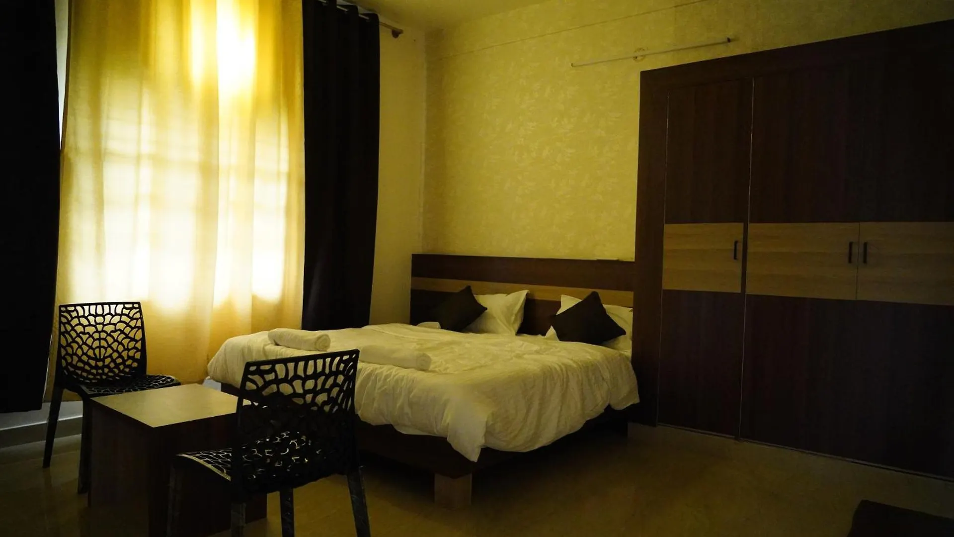 Meridian Rooms And Service Apartment Mysore
